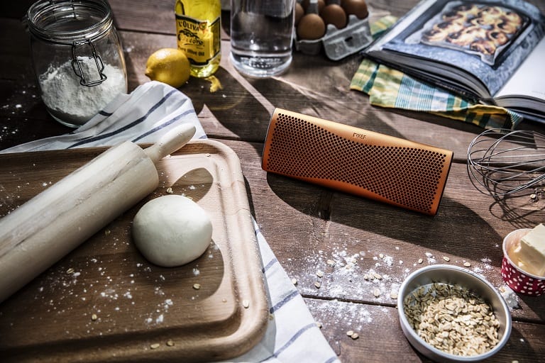 KEF MUO sunset orange - lifestyle - Bluetooth speaker
